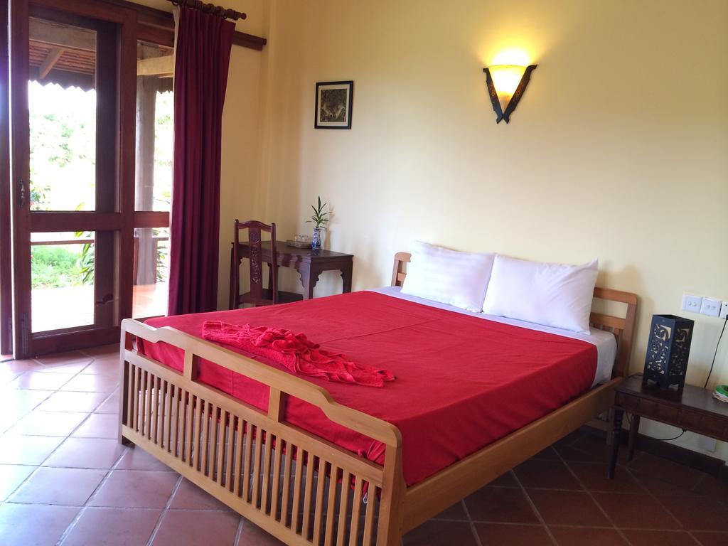 Green Plateau Lodge Banlung Quarto foto
